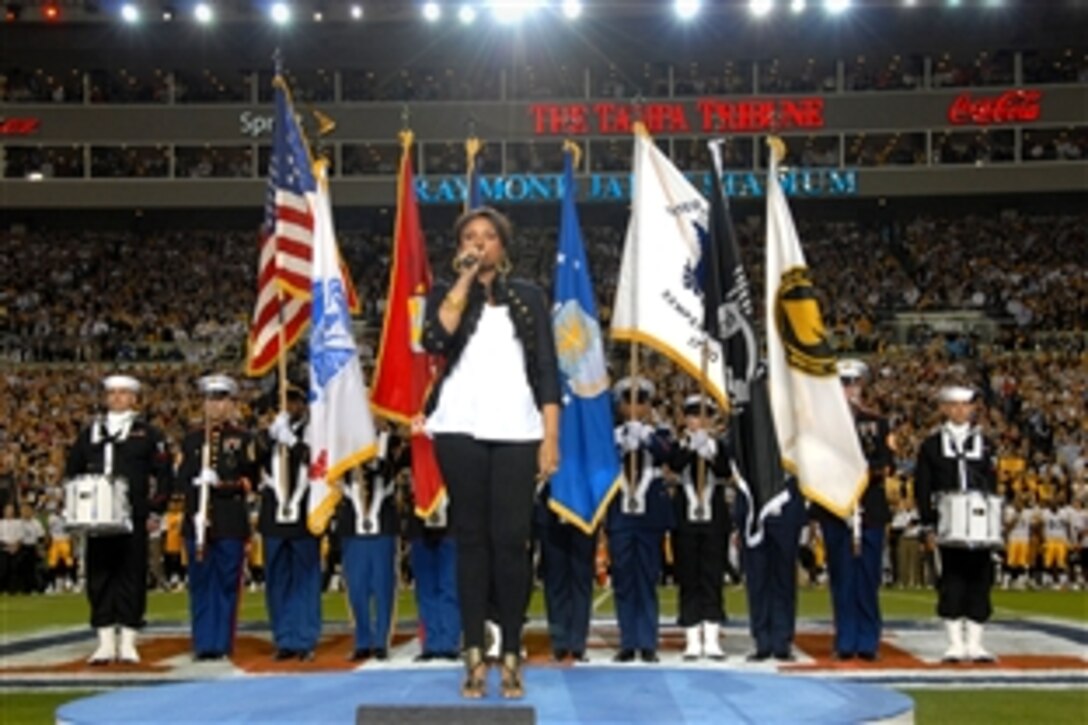 Singer-songwriter Jennifer Hudson sings the National Anthem before the start of Superbowl XLIII, Feb. 1, 2009, at Raymond James Stadium in Tampa, Fla.  The Special Operations Command Joint Service Color Guard from MacDill Air Force Base, Fla., presented the colors.
