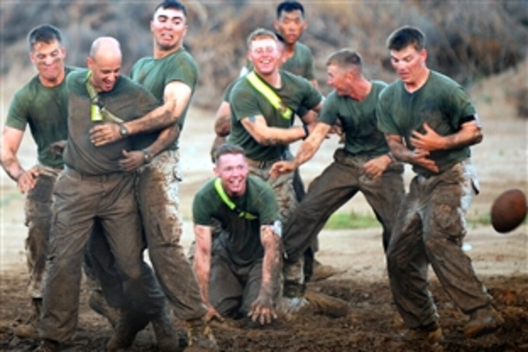 U.S. Marines participate in a game of ultimate football after a physical training session on the last day of a two-week corporals leadership course on Camp Lemonier, Djibouti, Jan. 29, 2008. The Marines are assigned to the 9th Provisional Security Forces from Combined Joint Task Force-Horn of Africa.