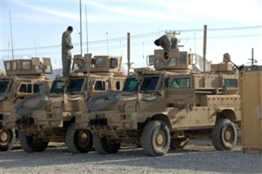 U.S. Army soldiers from Alpha Company, 1st Platoon, Personnel Security Detail, 101st Airborne Division prepare for a mission at Bagram Airfield, Afghanistan, on Jan. 31, 2009.  