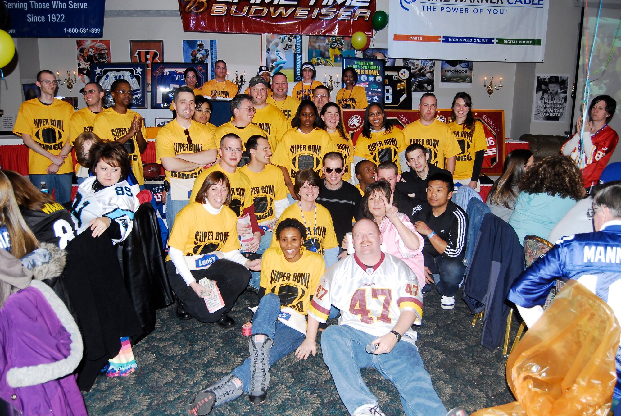 More than 25 volunteers assisted with the 2009 Pope Super Bowl Bingo event at the Pope Club Jan. 17. Volunteers sold tickets, carried food, collected money and ensured this year’s event went off without a hitch. (U.S. Air Force Photo by Tech. Sgt. Todd Wivell)