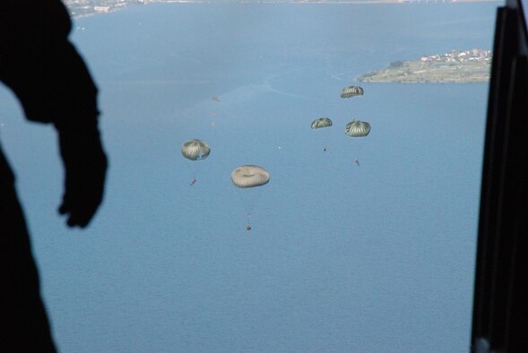 PATRICK AIR FORCE BASE, Fla. - Air Force Reservists from the 920th Rescue Wing here train together to perform astronaut recovery for the NASA manned space shuttle launches such as the one scheduled for lift off February 12.  Five pararescuemen performed a high altitude low opening jump off of the back ramp of the HC-130P/N Hercules aircraft to hone their parachuting skills should they need to launch a search in rescue mission if something were to happen to the astronauts over the Atlantic Ocean during lift off.  The pararescuemen are also trained emergency medical technicians so once they reach a survivor they are able to perform medical treatment until they are able to be transported to a hospital.  (U.S. Air Force photo/Capt. Cathleen Snow)