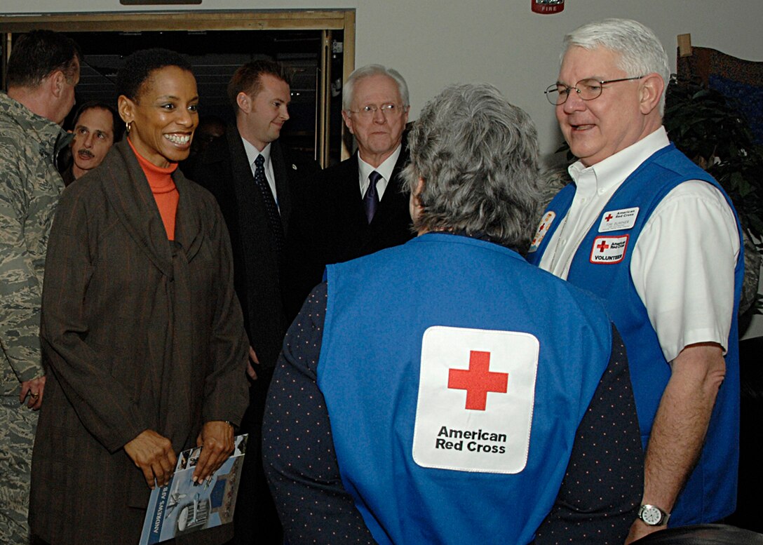 Congresswoman Donna F. Edwards, of the 4th district of Maryland, spoke with Red Cross volunteers inside the Aeromedical Staging Facility, also known as the ASF, on January 30, 2009. Congresswoman Edwards along with Congressman Steny H. Hoyer were given a tour of the ASF before they were taken to the Andrews AFB flight line to greet wounded worriers. (US Air Force/A1C Melissa V. Rodrigues)
