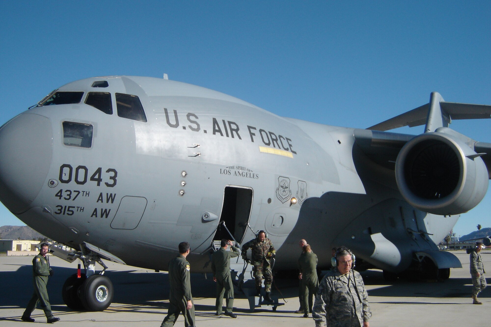 People check out "The Spirit of Los Angeles" after it arrived at March Air Reserve Base, Calif., Jan. 23, 2009. The aircraft is the ninth C-17 Globemaster III to join Air Force Reserve Command's 452nd Air Mobility Wing. The plane came from the 437th Airlift Wing, Charleston Air Force Base, S.C., which acquired it in 1998. About 16 of the aircraft were built last year for delivery to Regular Air Force units to replace their older C-17s. (U.S. Air Force photo/Will Alexander)

