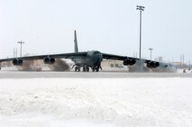 MINOT AIR FORCE BASE, N.D. – A B-52H Stratofortress performs an eight engine “can start” during a recent Bomber Strategic Aircraft Regeneration Team (BSART) exercise here Jan. 28.  A “can start” is when gunpowder is loaded into a canister that is placed inside the engine and then ignited to rapidly spin the engine up to full speed.  The BSART exercise involves more than 250 personnel who are forward deployed to an undisclosed location to set up an alternative deterrent base to service and refit aircraft for future strike missions. (U.S. Air Force photo by Staff Sgt. Keith Ballard)