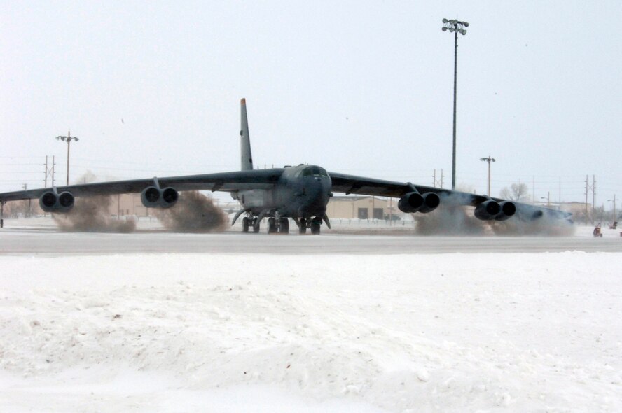 MINOT AIR FORCE BASE, N.D. – A B-52H Stratofortress performs an eight engine “can start” during a recent Bomber Strategic Aircraft Regeneration Team (BSART) exercise here Jan. 28.  A “can start” is when gunpowder is loaded into a canister that is placed inside the engine and then ignited to rapidly spin the engine up to full speed.  The BSART exercise involves more than 250 personnel who are forward deployed to an undisclosed location to set up an alternative deterrent base to service and refit aircraft for future strike missions. (U.S. Air Force photo by Staff Sgt. Keith Ballard)