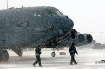 MINOT AIR FORCE BASE, N.D. – Crew chiefs from the 5th Aircraft Maintenance Squadron perform checks on a B-52H Stratofortress during a recent Bomber Strategic Aircraft Regeneration Team (BSART) exercise here Jan. 28.  The BSART involves more than 250 personnel who are forward deployed to an undisclosed location to set up an alternative deterrent base to service and refit aircraft for future strike missions. (U.S. Air Force photo by Staff Sgt. Keith Ballard)