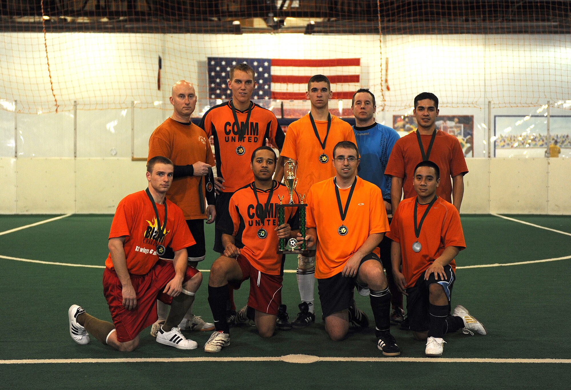 OFFUTT AIR FORCE BASE, Neb. --  The 55th Communication Group intramural soccer team "COMM UNITED," poses in front of the second place trophy for the 2009 intramural soccer league. COMM United was defeated by the team from U.S. Strategic Command 4-1 in the championship game at the Offutt Field House, Feb. 2.

U.S. Air Force Photo by Josh Plueger
