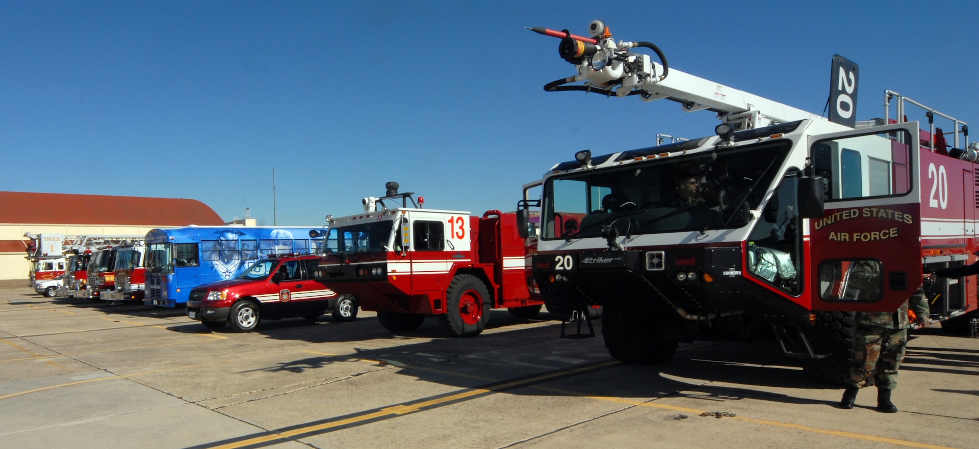 Randolph emergency vehicles stand at the ready during a training session with local emergency responders Feb. 1. Several local fire departments visited Randolph to train on proper response procedures to downed 12th Flying Training Wing aircraft in the event one crashed in their city. (U.S. Air Force photo by Steve White)