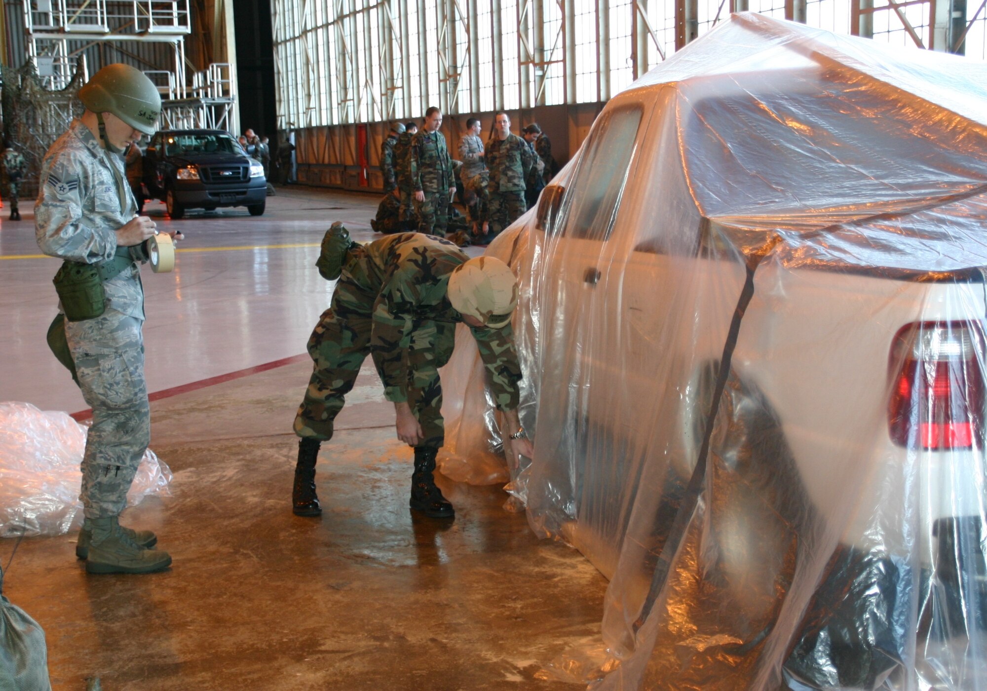 Airmen are hard at work at the Contamination Control Vehicle Covering event at the ATSO Rodeo Jan. 30.