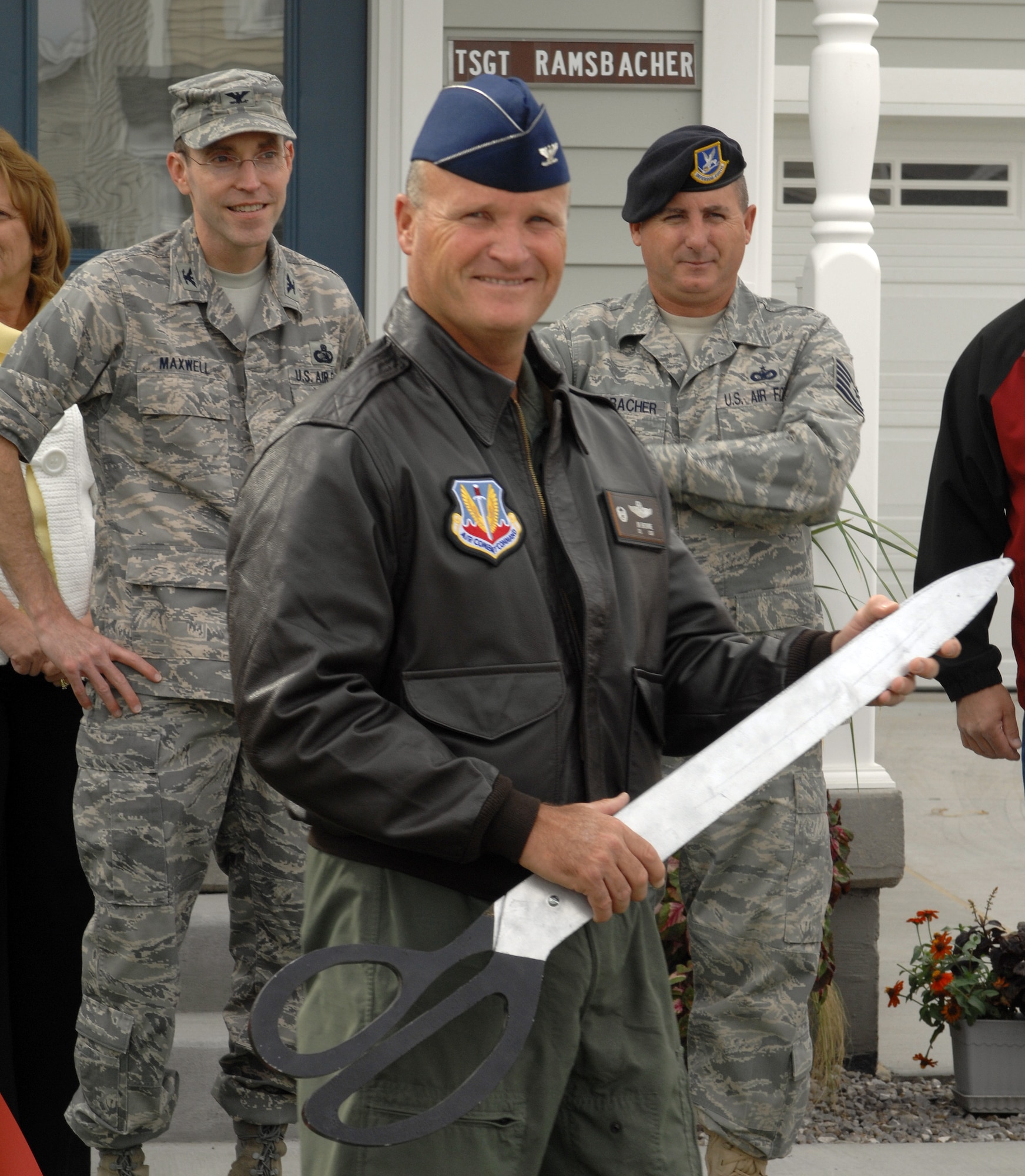 MOUNTAIN HOME AIR FORCE BASE, Idaho - Col. James Browne, 366th Fighter Wing commander, gives a speech after cutting a ribbon opening up a new housing development Sept. 25, 2008. Parsons, a local construction company, spent about two years to complete 147 units. This is a design-build project which means as soon as it is built the key is handed over and the house is ready for occupancy. (U.S. Air Force photo/ Airman Deborah Lockhart)