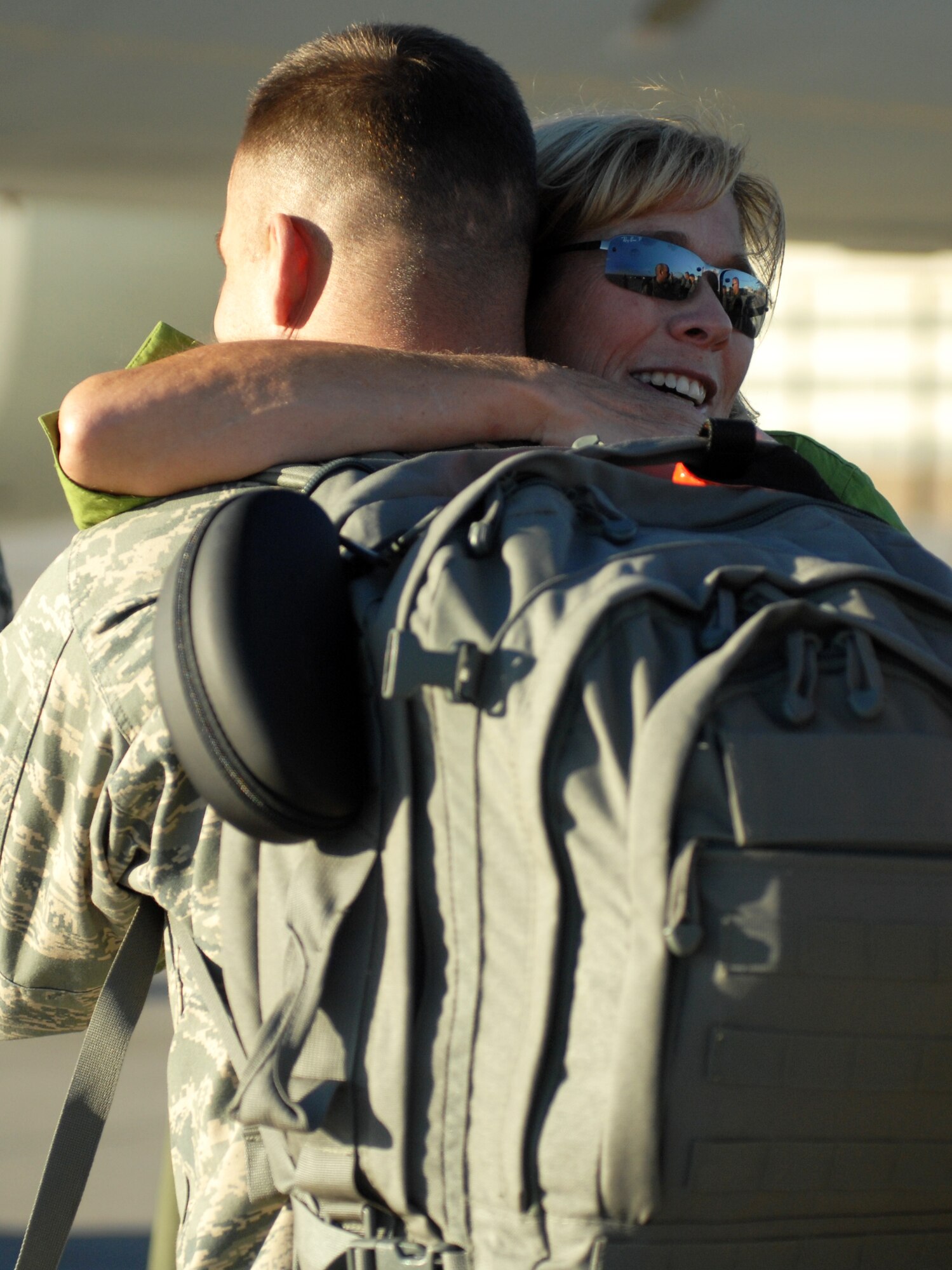 MOUNTAIN HOME AIR FORCE BASE, Idaho - Alison Brown, wife of Col. James S. Browne, 366th Fighter Wing commander, hugs departing Airmen before they deploy. (U.S. Air Force photo/ Airmen 1st Class Stephany Miller)