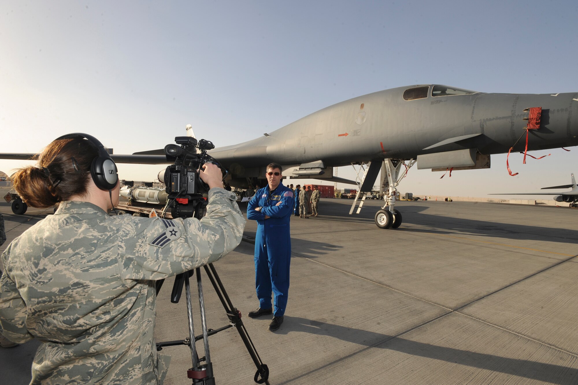 Senior Airman Katerina Slivinske, the NCOIC of Video Production for the 379th Air Expeditionary Wing Public Affairs Office, interviews United States Navy Captain Stephen Bowen, a NASA Astronaut, during an Astronaut Armed Forces Entertainment visit to the base, Feb. 2, 2009, in an undisclosed location in Southwest Asia.  Capt. Bowen and fellow astronauts met with servicemembers to enlighten them on the NASA mission as well as to get a better understanding of the mission here. Airman Slivinske is native to Ventura, Calif. and deployed out of Holloman AFB, N.M. in support of Operations Iraqi and Enduring Freedom and Combined Joint Task Force - Horn of Africa.  (U.S. Air Force Photo by Staff Sgt. Joshua Garcia/released)