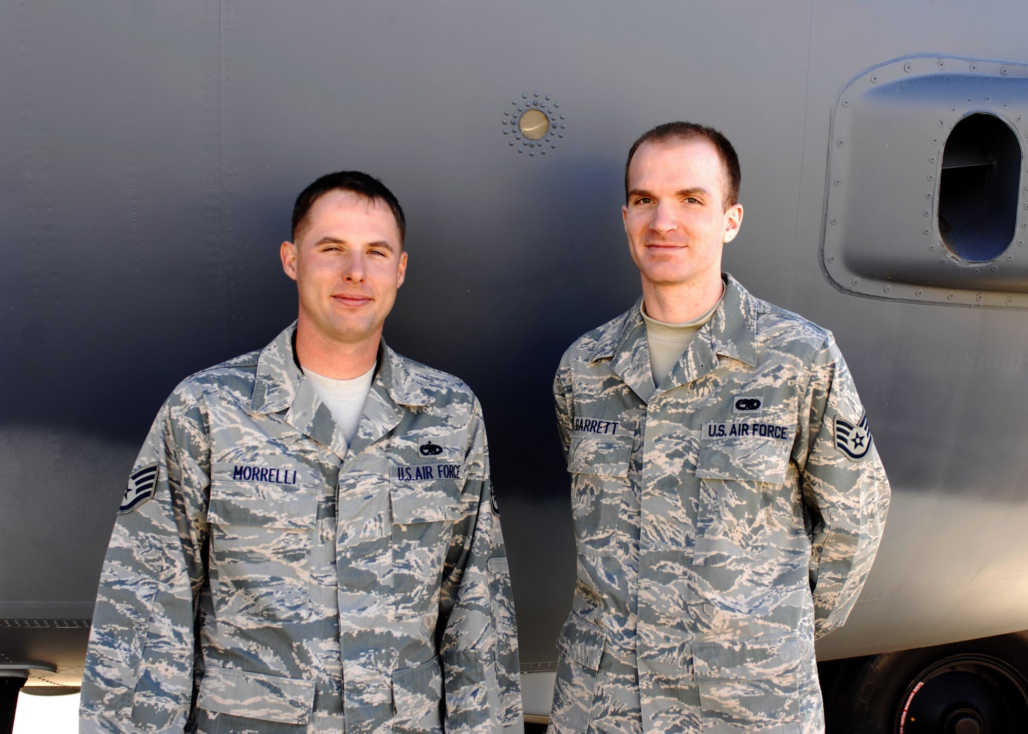 CANNON AIR FORCE BASE, N.M. -- Staff sergeants Chris Morrelli and Nolan Garrett stand in front of an MC-130W Combat Spear. The two are Dedicated Crew Chiefs for their aircraft, a title only a total eight NCOs at Cannon can claim. (Air Force photo by Greg Allen) 
