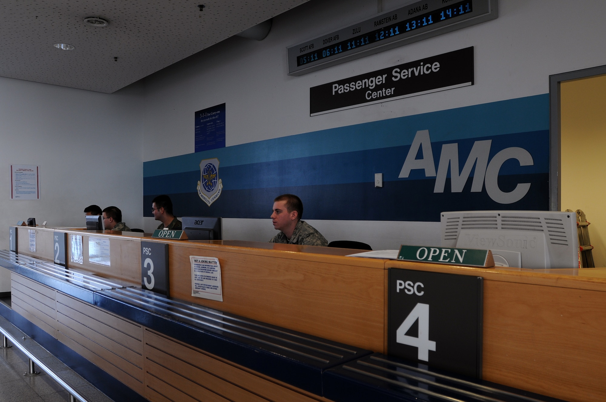 Airmen with the 721st Aerial Port Squadron mange the service desk at the Ramstein Air Base Passenger Terminal, Jan. 26, 2009. The Ramstein PAX terminal is the only one of its kind in Europe and is the pit stop point for most troops headed downrange. (U.S. Air Force photo by Airman 1st Class Kenny Holston) 