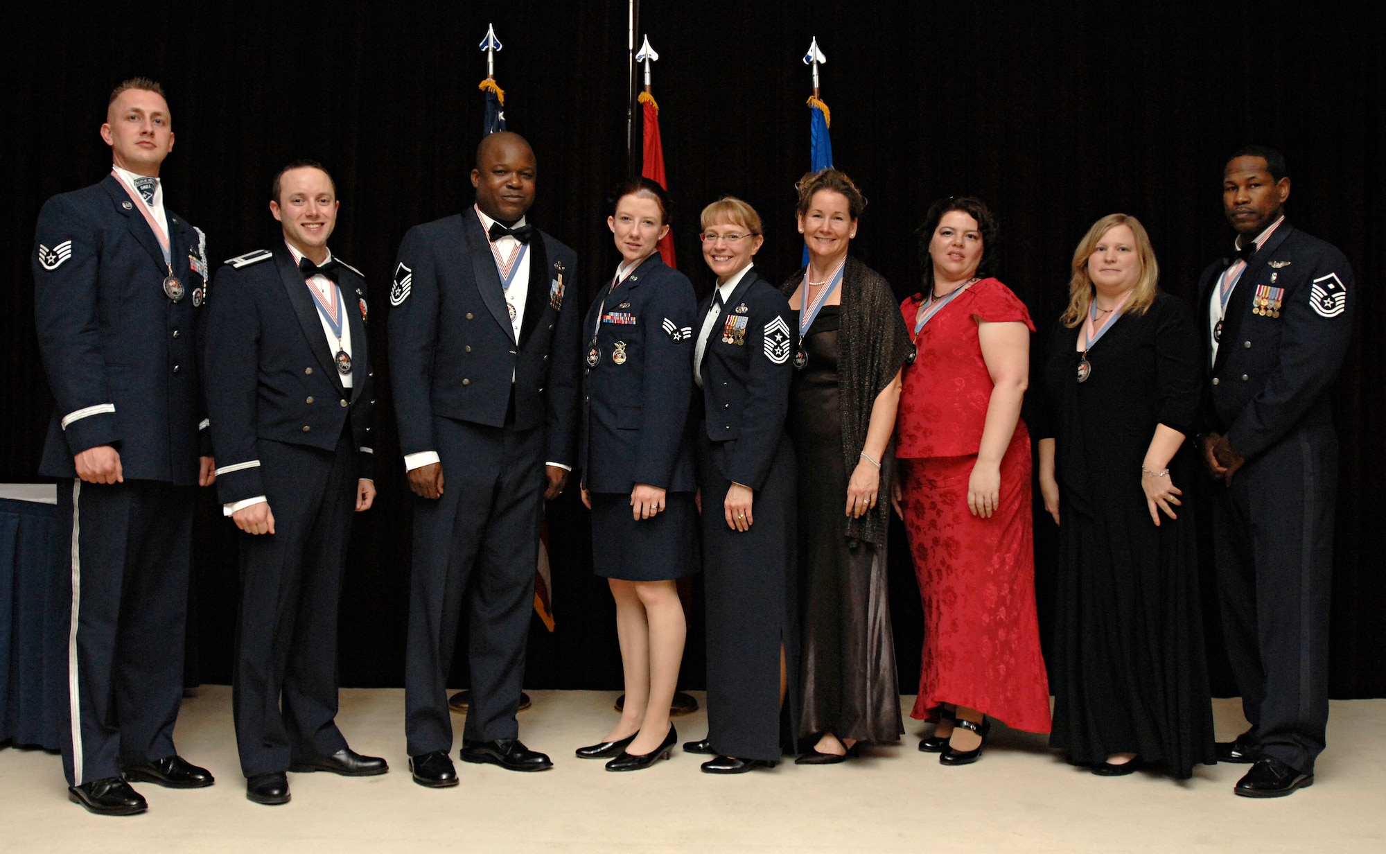 The 2008, 39th Air Base Wing Annual Award winners pose with Chief Master Sgt. Pamela Derrow, United States Air Forces in Europe command chief master sgt., at Incirlik’s Combined Club, Jan. 30. The annual awards banquet is held to honor the members of the wing that stood-out above their peers during the 2008 calendar year. (U.S. Air Force photo/Senior Airman Benjamin Wilson)