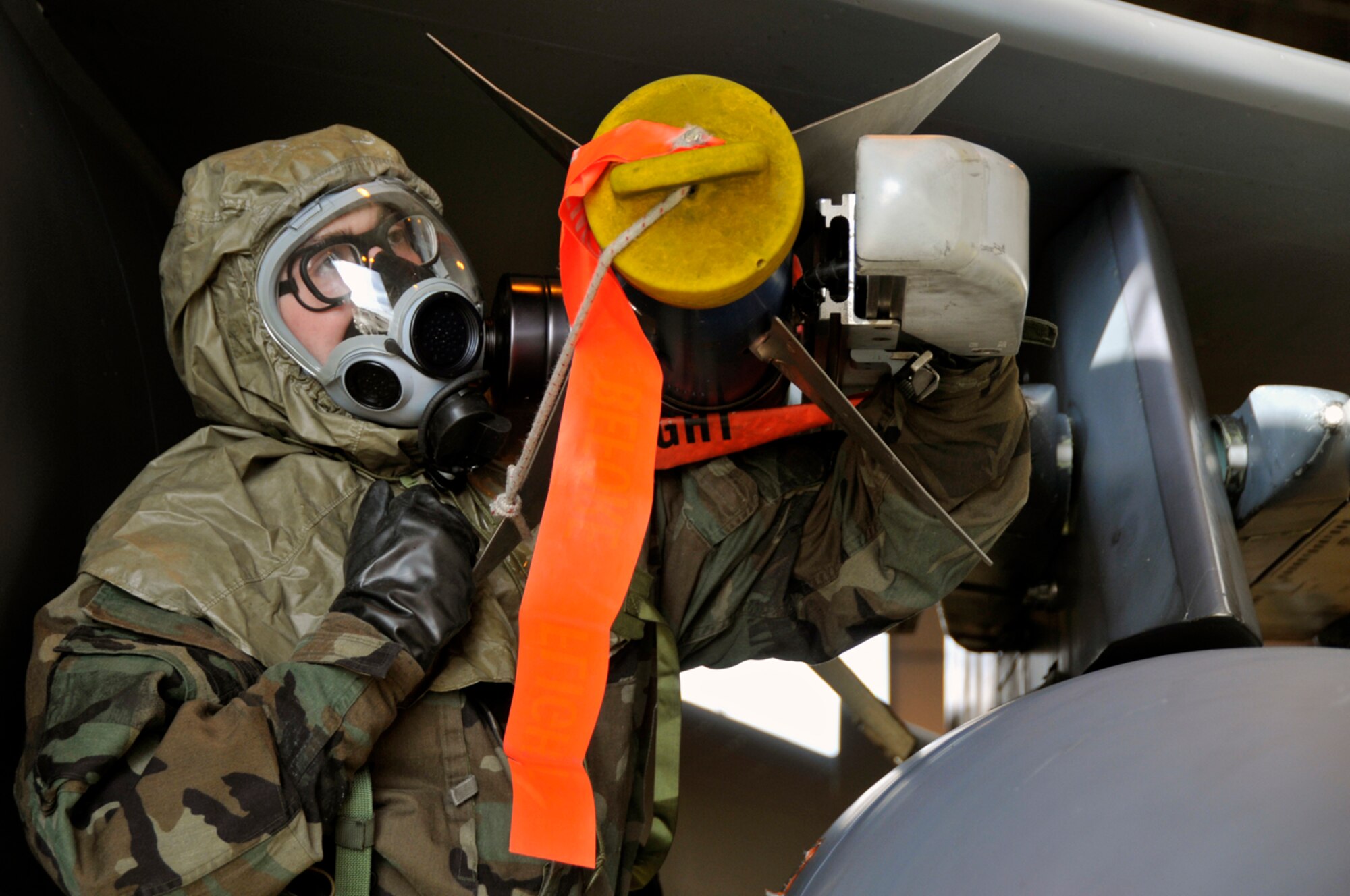 Staff Sgt. Tony Phillips, 48th Aircraft Maintenance Squadron weapons load crew member, connects an AIM-9 Sidewinder to the launcher Jan. 27 at RAF Lakenheath, England. The weapons load crew was participating in load crews certification training which all weapons loading personnel have to accomplish before loading live and training munitions on the flightline. (U.S. Air Force photo by Airman 1st Class Perry Aston)