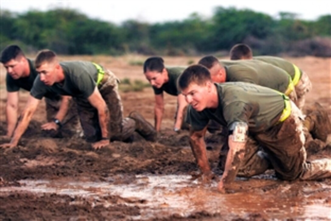 U.S. Marine Cpl. Garris, front, and other members of the 9th Provisional Security Forces from Combined Joint Task Force-Horn of Africa participate in physical training,on the last day of a two-week corporals leadership course on Camp Lemonier, Djibouti, Jan. 29, 2009. 