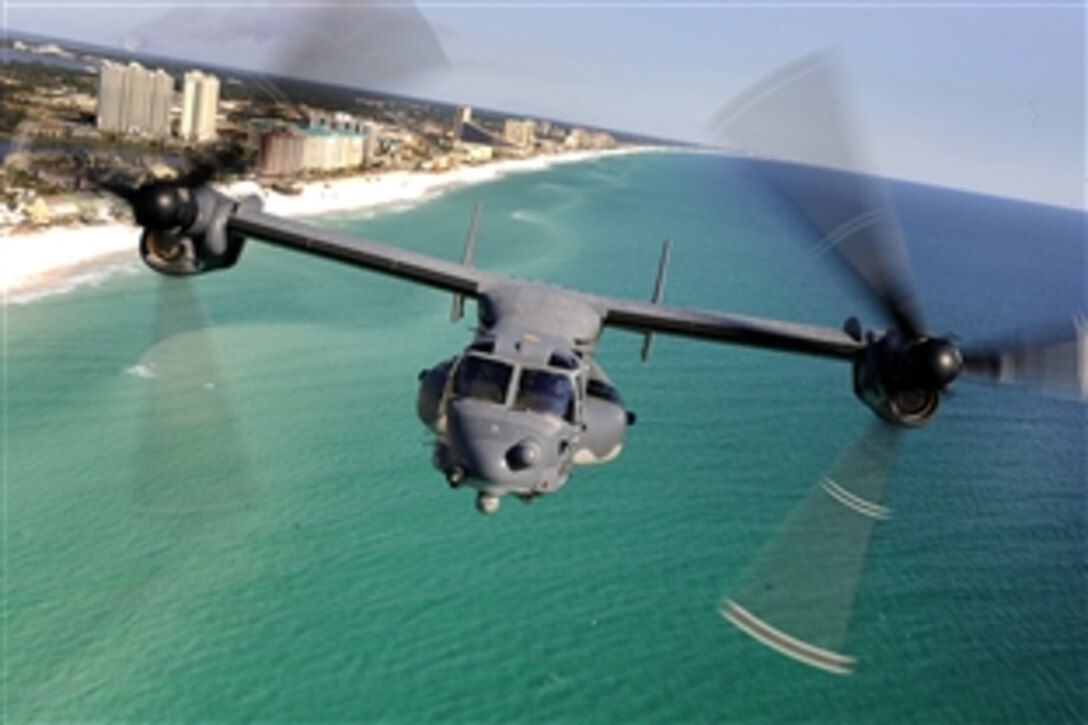 A CV-22 Osprey flies over Florida's Emerald Coast, Jan. 31, 2009. The crew and aircraft are assigned to the 8th Special Operations Squadron, Hurlburt Field, Fla. While over the water, the crew practiced using the hoist, a means to rescue stranded personnel.