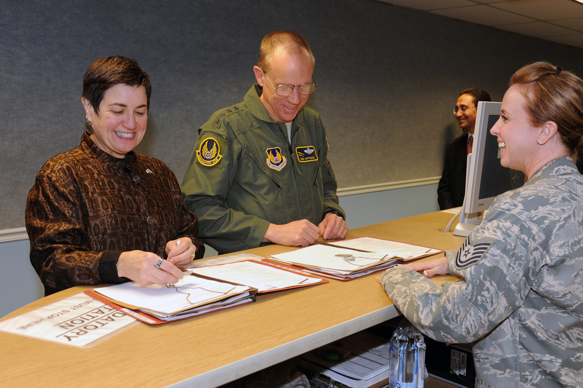 General Donald Hoffman, Air Force Material Command commander, and Jackie Hoffman experience going through a personnel deployment line during their immersion visit to Hill Air Force Base Feb. 3. 