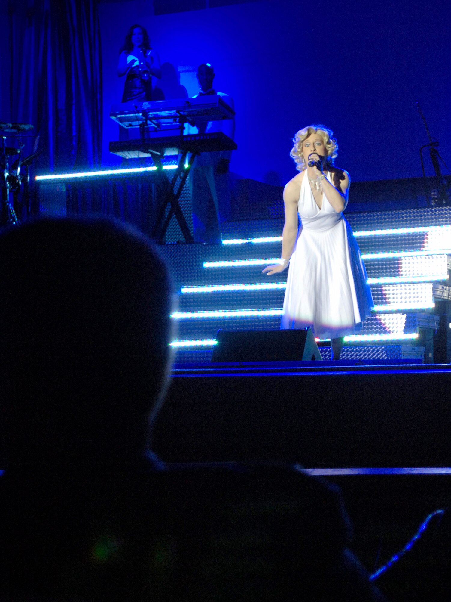 ORPHEUM THEATER, Kan. -- Tops in Blue performer Senior Airman April Vollm entertains a packed Wichita Orpheum Theater by singing to Col. Michael Krueger, 22nd Air Refueling Wing vice commander. Airman Vollm kept the crowd entertained with various comedy acts while her fellow performers changed costumes and prepare for their next song. (Photo by Senior Airman Laura Suttles)