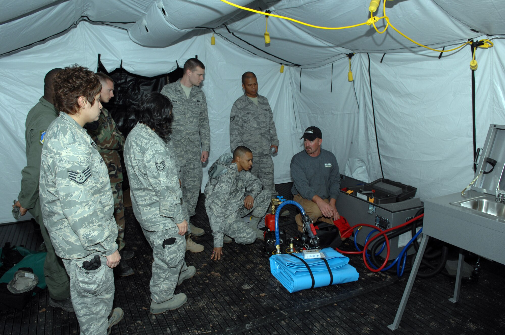 Members of the 563rd Rescue Squadron received training here January 28 on the construction and maintenance of rapidly-deployable mobile units called Base X that is custom built to support field operations in remote and sometimes harsh environments. 
