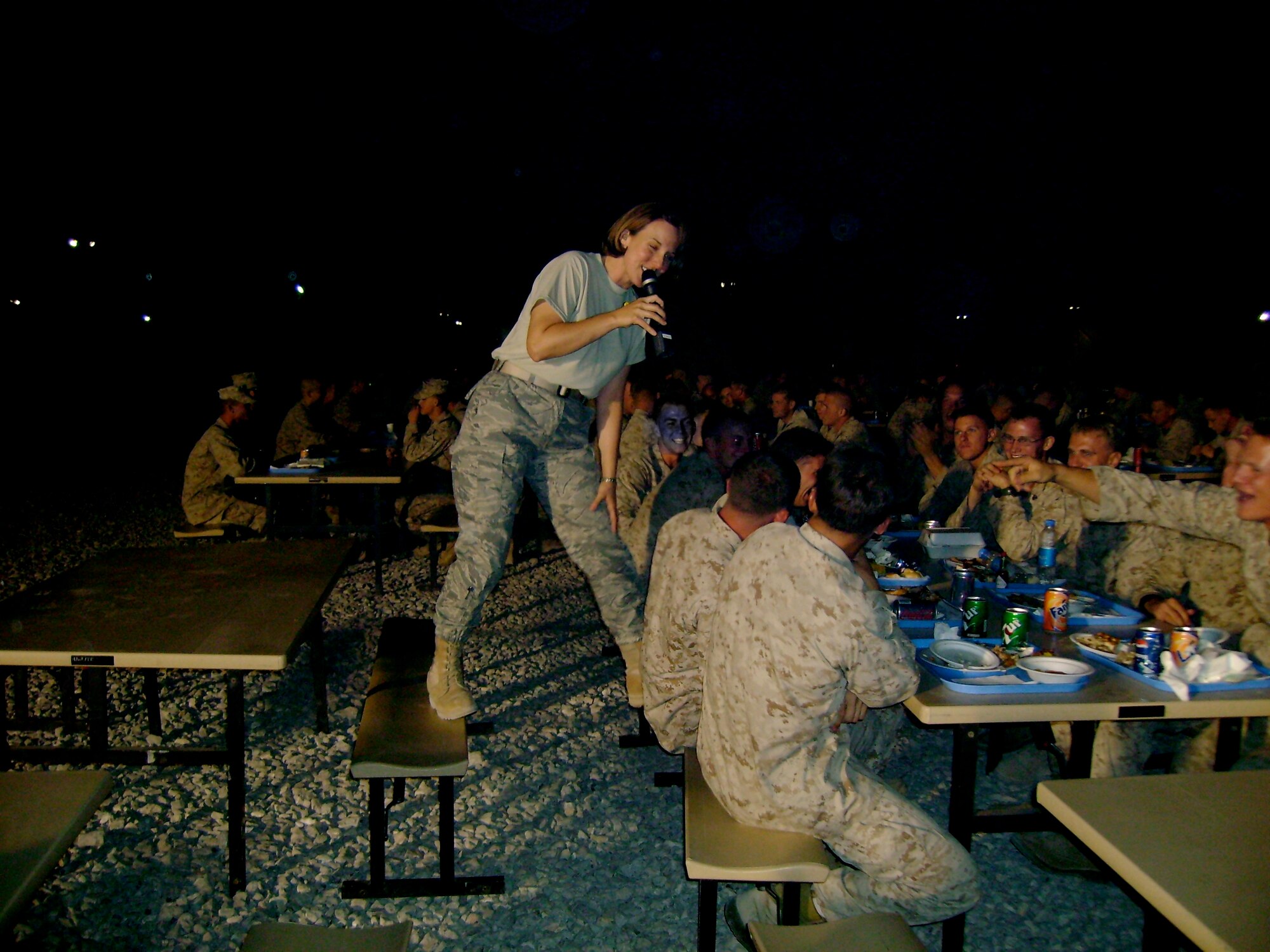 One of Mobility’s vocalists TSgt Paula Goetz entertains Marines during a recent deployment to Afghanistan.  Click on Ensembles tab to learn more about Mobility.
(Photo by SrA Rachel trimble)