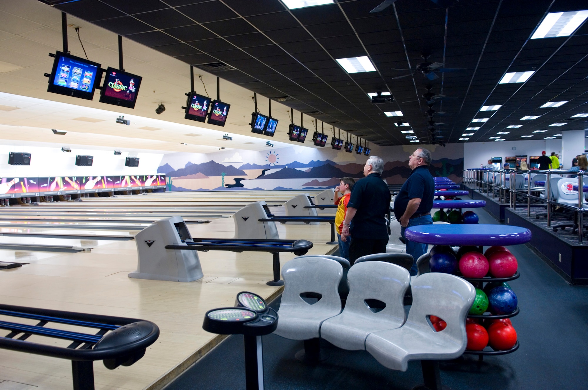 The High Desert Lanes Bowling Center opened Feb. 3 after receiving new, high-tech scoring system with flat screen monitors. (Air Force photo by Mike Cassidy)