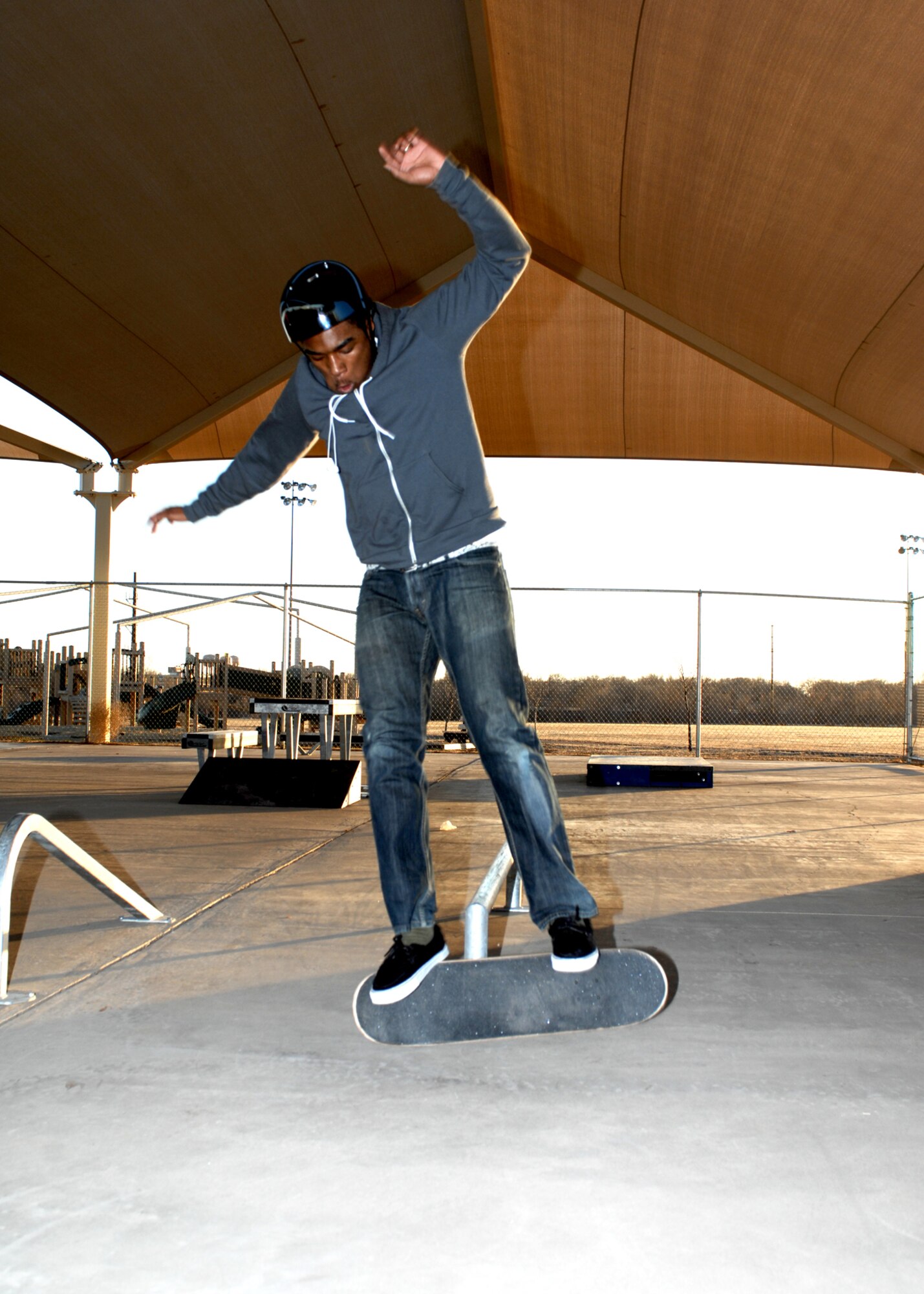 CANNON AIR FORCE BASE, N.M. -- Airman 1st Class Dominque Smith, 27th Special Operations Force Support Squadron, balances himself while skateboarding at the Cannon Skateboard Park on Feb. 3. The park opened in Oct., 2008, is located in the Chavez Major housing area and is avaiable to active military, their families, retirees, reservists, guard and Cannon employees. (Air Force photo by Greg Allen) 