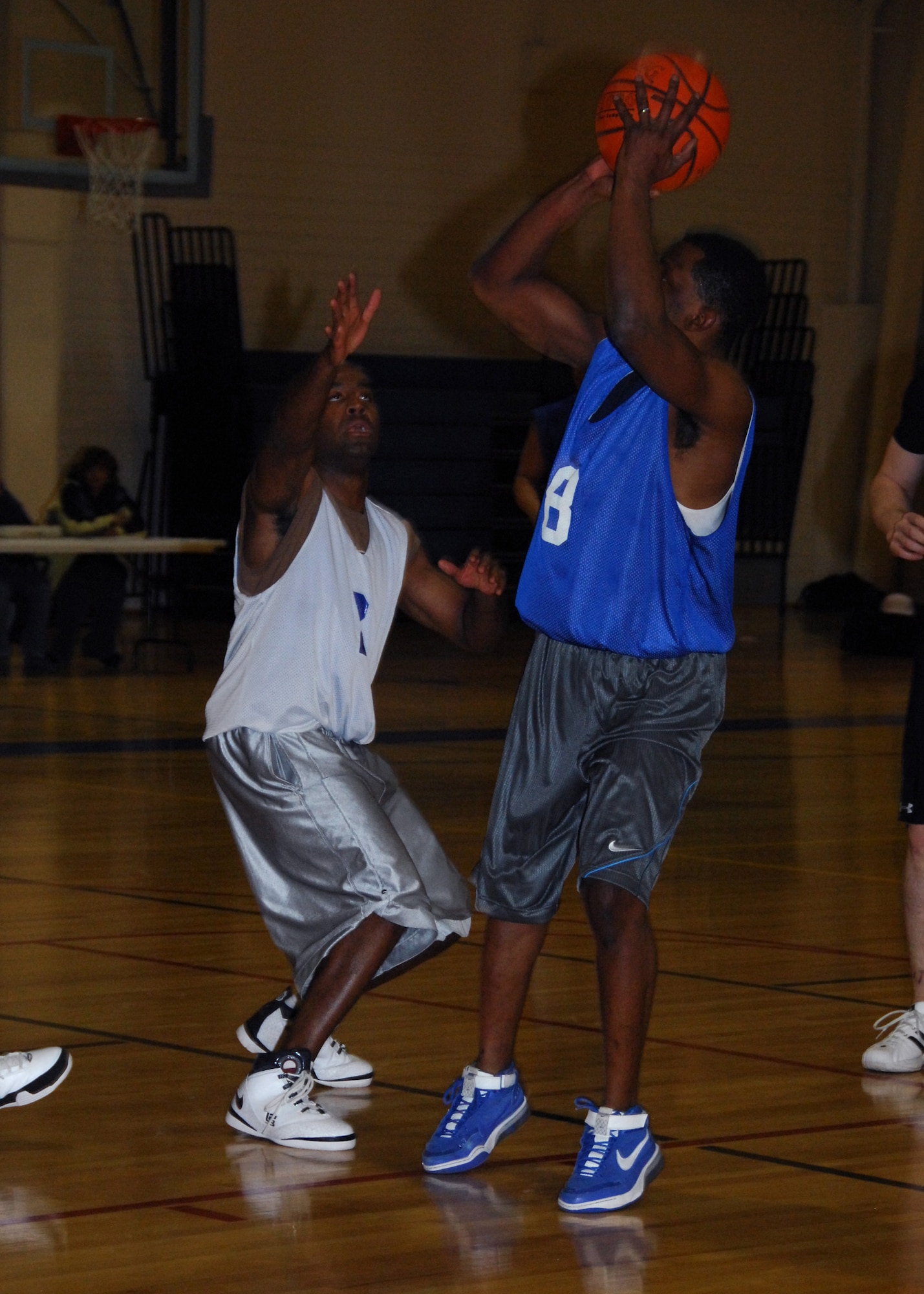 ELMENDORF AIR FORCE BASE, Alaska-- Airman 1st Class Louis Hall, 3rd Aircraft Maintanence Squadron, passes the ball during a basketball game in the Joint Base Elmendorf/Richardson tournament at the fitness center Jan. 28. (U.S. Air Force photo/1st Lt. Erin Slaughter)