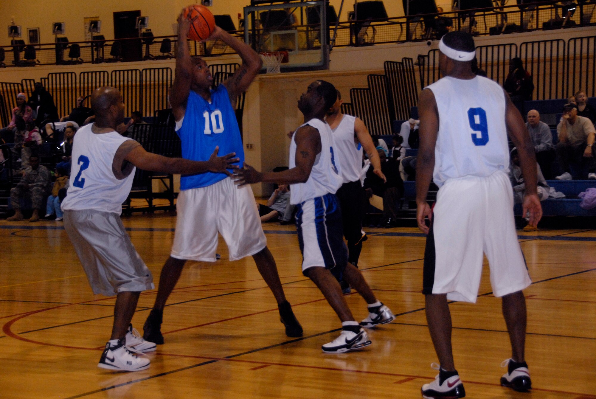 ELMENDORF AIR FORCE BASE, Alaska--Master Sgt. Kimble Peterson, 3rd Operations Support Squadron, takes a shot during a game in the Joint Base Elmendorf/Richardson Tournament Jan. 28 at Elmendorf fitness center. (U.S. Air Force photo/Airman 1st Class Cynthia Spalding)