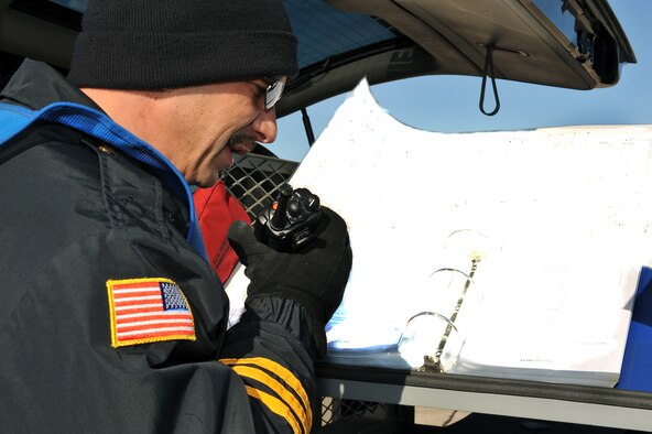 OFFUTT AIR FORCE BASE, Neb. -- James Kuttner, an assistant fire chief with 55th Civil Engineer Squadron, as the incident commander in a Major Accident Response Exercise and directs other responders Feb. 2. Offutt personnel constantly train help enhance their skills and response time if a real accident were to occur. Photo By: Charles Haymond 