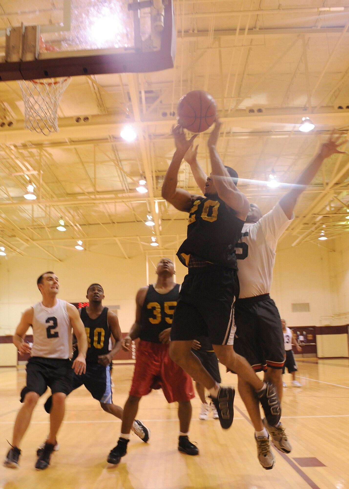 Troy Goodwin, 4th Force Support Squadron, goes up for a jump shot on Seymour Johnson Air Force Base, N.C., Feb. 2, 2009. The jump shot helped FSS win the intramural game against the 4th Medical Group. (U.S. Air Force photo by Airman 1st Class Whitney Stanfield)