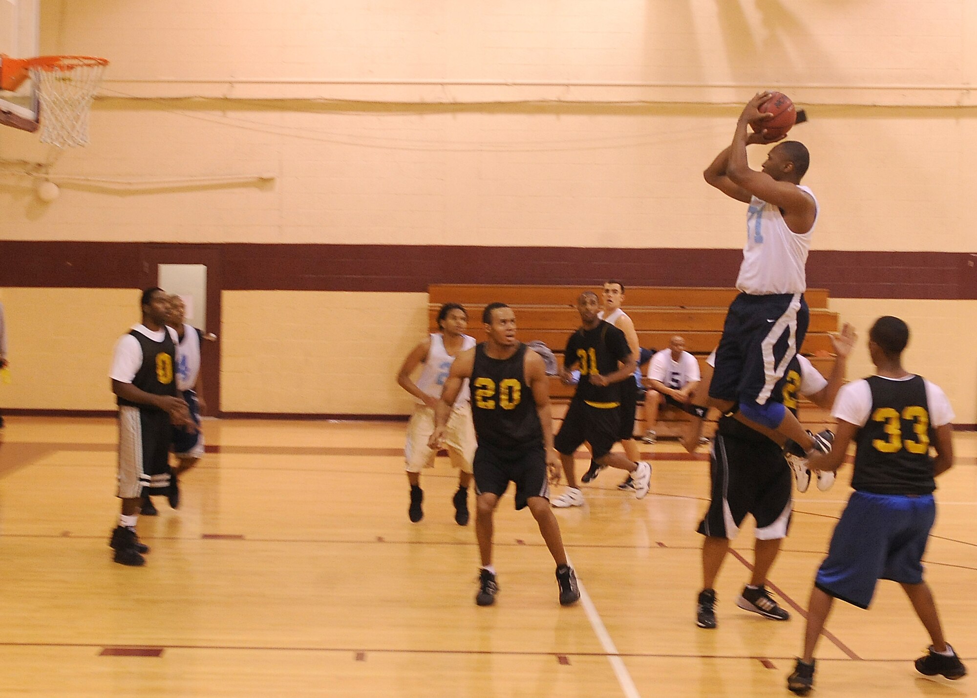 Terrace Gill, 4th Medical Group, takes a jump shot at Seymour Johnson Air Force Base, N.C., Feb. 2, 2009. The 4th Medical Group played a neck to neck game against 4th Force Support Squadron. (U.S. Air Force photo by Airman 1st Class Whitney Stanfield)