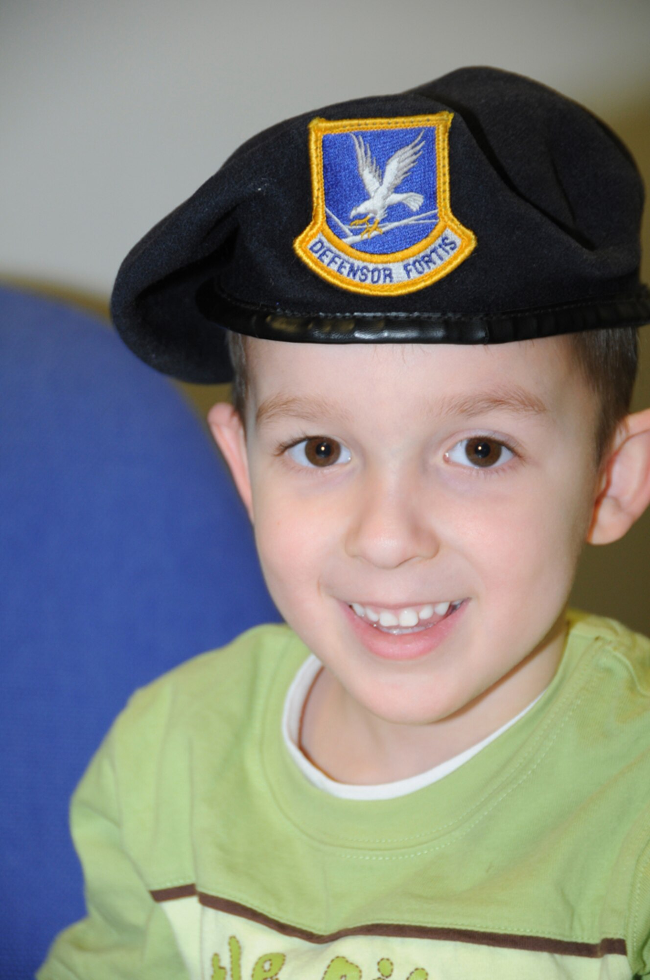 Dominick, son of Staff Sgt. Manny Rodriguez, 48th Security Forces Squadron individual newcomer treatment and orientation monitor, sports a beret as a temporary member of the 48th SFS Feb. 2 at RAF Lakenheath, England. Dominick spent the day with his dad, learning what he does and helping with daily tasks during a Job Shadow Day. (U.S. Air Force photo by Senior Airman Nicholas McNaughton)