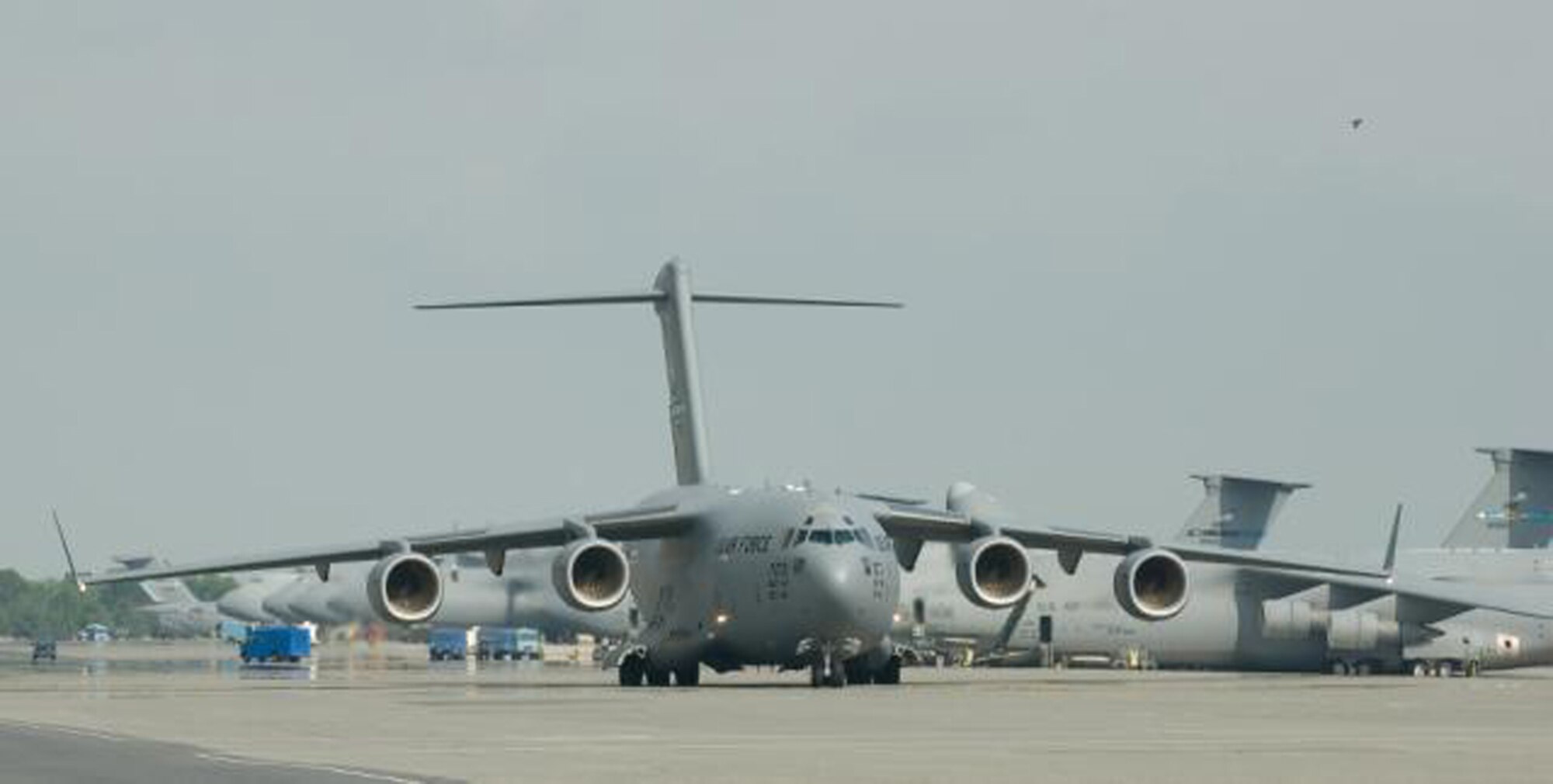 A Dover C-17 Globemaster IIIs taxis down the flightline at Dover Air Force Base. (U.S. Air Force Photo / Jason Minto) 