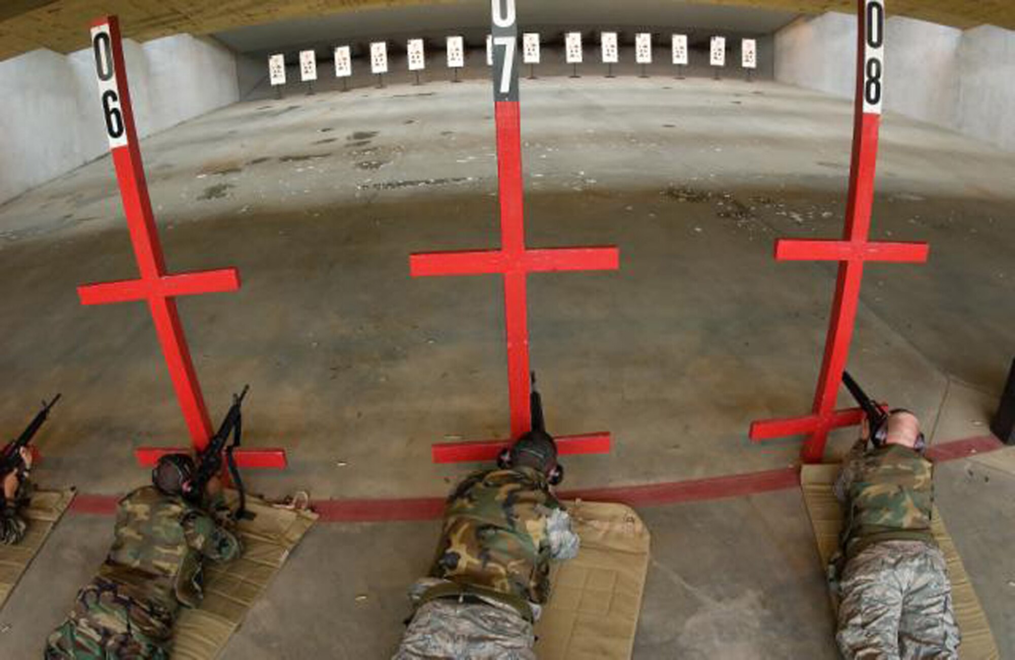 Team Dover Airmen practice with M-16A2 rifles on the shooting range as part of the forward deploy training. (U.S. Air Force Photo / Jason Minto) 