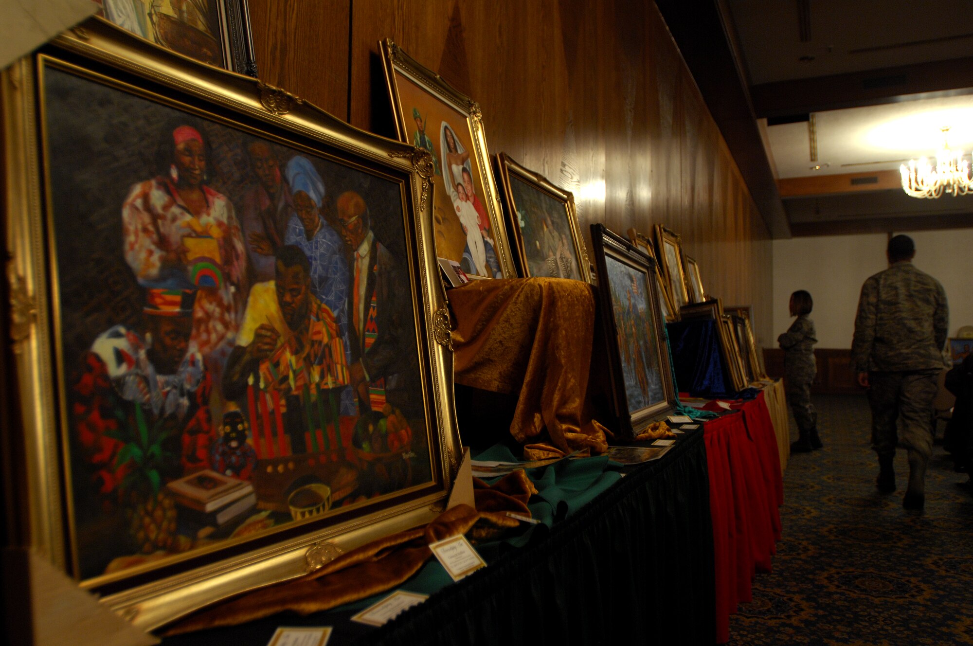 Several paintings are displayed for the African American History Month luncheon Jan. 30, 2009, at the Ramstein Air Base Officers Club. The month dedicated to African American heritage kicked-off with the luncheon and will be celebrated throughout the month of February. (U.S. Air Force photo by Airman 1st Class Kenny Holston) 