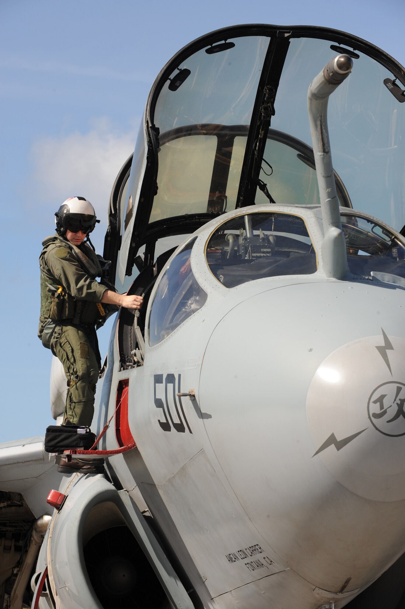U.S. Navy Lt. j.g. Richard Rosenbush, electronic counter measures operator makes a final look over of an EA-6B Prowler, Feb. 3 at Andersen Air Force Base, Guam prior to a local area mission during exercise Cope North 09-1. Navy EA-6B Prowlers from VAQ-136 Carrier Air Wing Five, Atsugi, Japan along with Japan Air Self Defense Force F-2s  from the 6th Squadron, Tsuiki Air Base and E-2Cs from the 601st Squadron, Misawa Air Base will join forward deployed USAF  F-16 Fighting Falcons from the 18th Aggressor Squadron, Eielson Air Force Base, Alaska, B-52 Stratofortress' currently deployed to Andersen AFB, Guam from the 23rd Expeditionary Bomb Squadron will participate in this year's Cope North exercise Feb. 2-13, with a focus on interoperability. (U.S. Air Force photo/ Master Sgt. Kevin J. Gruenwald) 