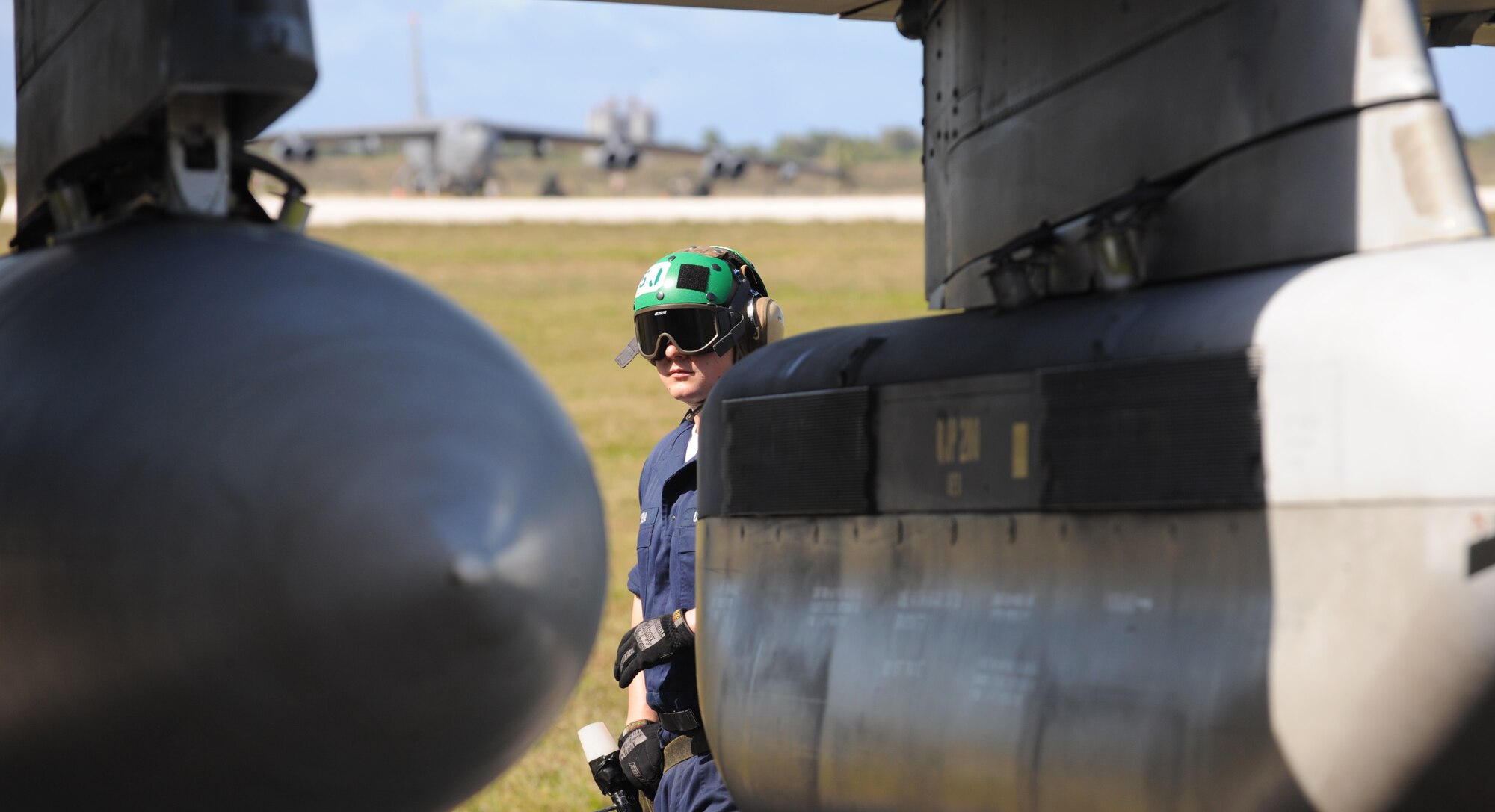 Petty Officer 3rd Class Christopher Oneil aviation machinist mate, performs pre-launch procedures on an EA-6B Prowler, Feb. 3 at Andersen Air Force Base, Guam prior to a local area mission during exercise Cope North 09-1. Navy EA-6B Prowlers from VAQ-136 Carrier Air Wing Five, Atsugi, Japan along with Japan Air Self Defense Force F-2s  from the 6th Squadron, Tsuiki Air Base and E-2Cs from the 601st Squadron, Misawa Air Base will join forward deployed USAF  F-16 Fighting Falcons from the 18th Aggressor Squadron, Eielson Air Force Base, Alaska, B-52 Stratofortress' currently deployed to Andersen AFB, Guam from the 23rd Expeditionary Bomb Squadron will participate in this year's Cope North exercise Feb. 2-13, with a focus on interoperability. 

(U.S. Air Force photo/ Master Sgt. Kevin J. Gruenwald) released





















  












 











































  












 

























