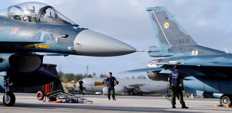 ANDERSEN AIR FORCE BASE, Guam - Japan Air Self-Defense Force F-2 maintainers perform pre-flight inspections during Cope North 09-1 Feb. 4 here. The F-2s are from the 6th Tactical Fighter Squadron, Tsuiki Air Base, Japan. Cope North enhances U.S. and Japanese air operations in defense of Japan. (U.S. Air Force photo by Senior Airman Nichelle Griffiths)