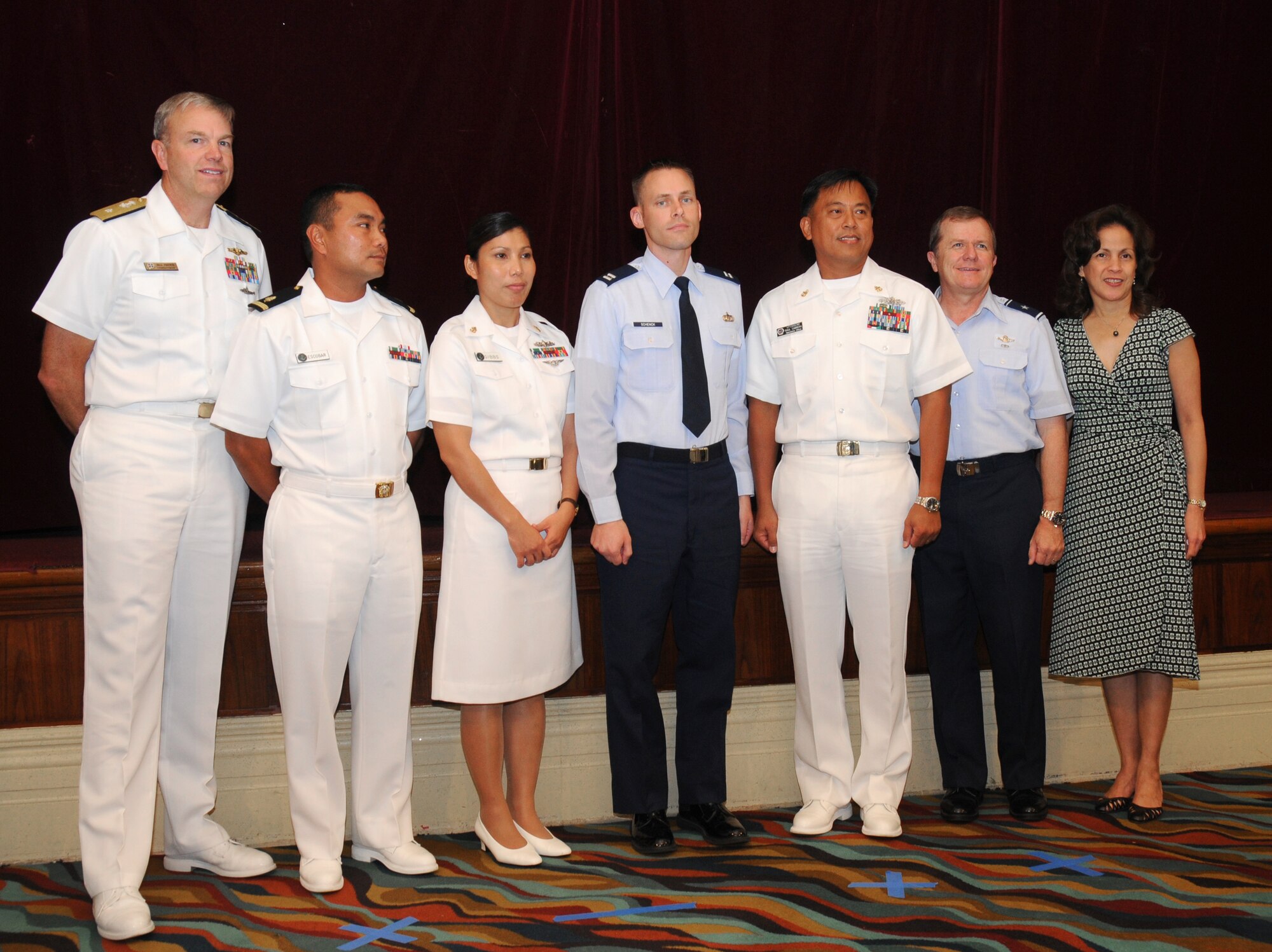 ANDERSEN AIR FORCE BASE, Guam -  Project officers for the Combined Federal Campaign at Andersen and Naval Base Guam pose with Guam's  First Lady Joann Camacho, Rear Admiral William French,  U.S. Naval Forces Marianas commander, and Brig. Gen. Philip Ruhlman, 36th Wing commander, at the CFC award ceremony on Feb. 2 at the Hilton Guam Resort & Spa. The 36th Wing and Naval Forces Marianas increased donations by more than 11 percent from 2007. (U.S. Air Force photo by Staff Sgt. Jamie Lessard) 
