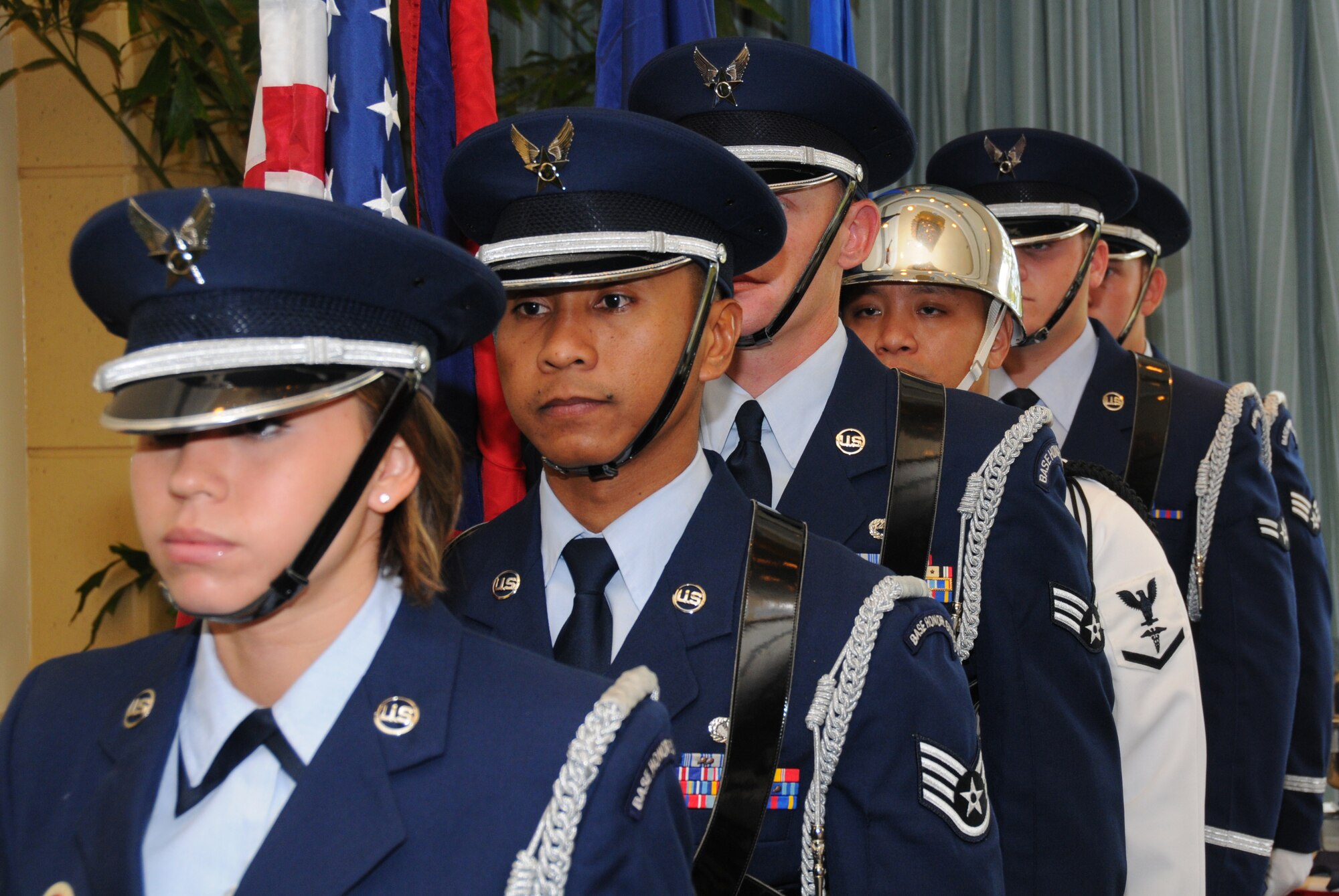 ANDERSEN AIR FORCE BASE, Guam – Andersen and Naval Base Guam honor guard members prepare to post the colors during the Combined Federal Campaign award ceremony Feb. 2 at the Hilton Guam Resort & Spa. The annual CFC award ceremony recognizes servicemembers who made contributions. (U.S. Air Force photo by Staff Sgt Jamie Lessard)