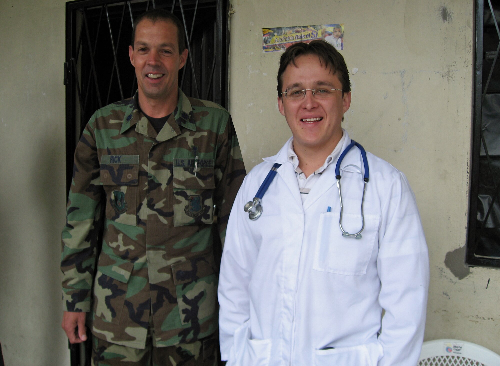 Dr. (Lt. Col.) James Rick, from Wright-Patterson Air Force Base, and an Ecuadorian
physician take a break from providing patient care during a visit to Tomebamba,
Ecuador.  Rick and other 88th Medical Group Airmen deployed to Ecuador supporting U.S. Southern Command's MEDRETE exercise in September and October 2008. (U.S. Air Force photo)
