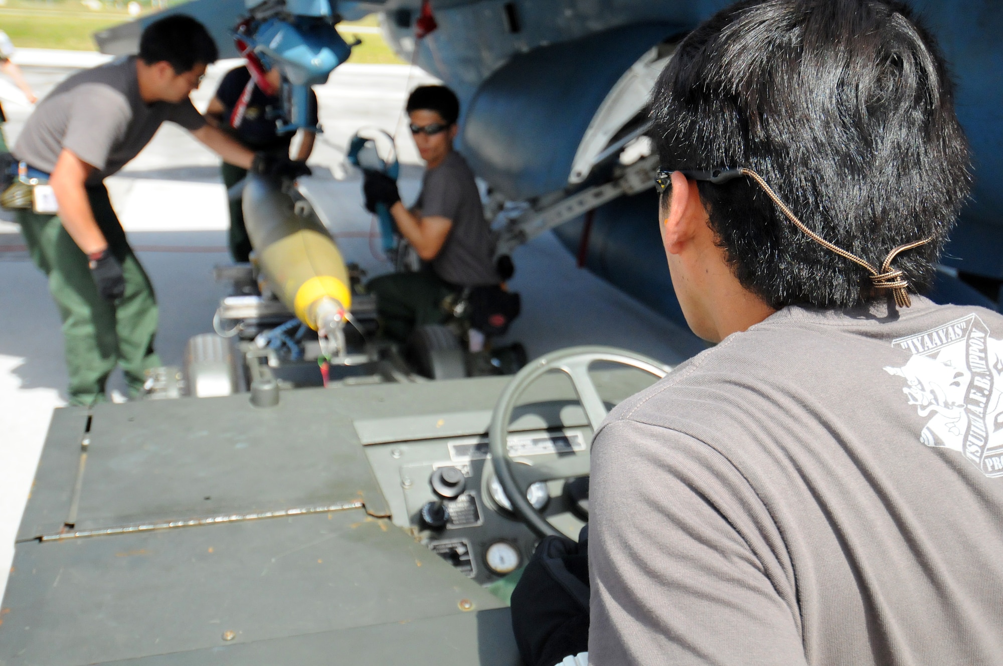 ANDERSEN AIR FORCE BASE, Guam - Japan Air Self Defense Force armament specialists work together to load an M-117 ordnance for a Cope North exercise here Feb. 5. This will be the tenth time the United States and Japan have held a Cope North exercise on Guam, and it will be the fourth time that the JASDF will use live ordinance.(U.S. Air Force photo by Airman 1st Class Courtney Witt)(released)



 
