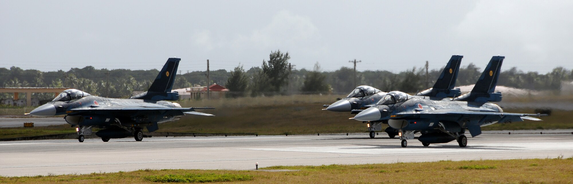 ANDERSEN AIR FORCE BASE, Guam - Japan Air Self Defense Force F2-X's line up for take-off here during an exercise for Cope North Feb. 5. The exercise has been in the planning stages for several months and bears no connection to any real-world events. This will be the tenth time the United States and Japan have held a Cope North exercise on Guam, and it will be the fourth time that the JASDF will use live ordinance.(U.S. Air Force photo by Airman 1st Class Courtney Witt)(released)

