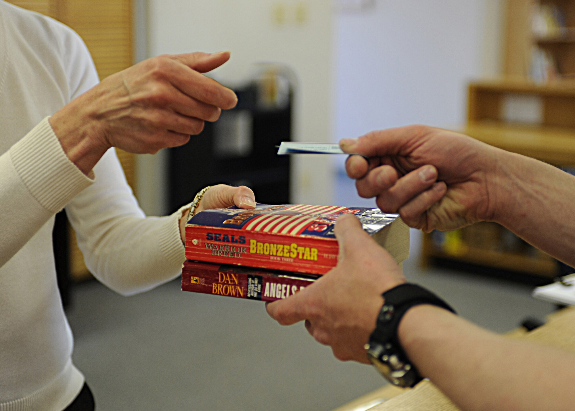 CANNON AIR FORCE BASE -- The "Swap Shop" is open at the base library and individuals can swap music, books, movies and more. The library staff will issue a ticket for a useable item that can be swapped on Feb. 26, 27, and 28 for a similar item. For more information on this program that will be conducted monthly, call 784-2786. (Air Force photo by Airman 1st Class Evelyn Chavez)