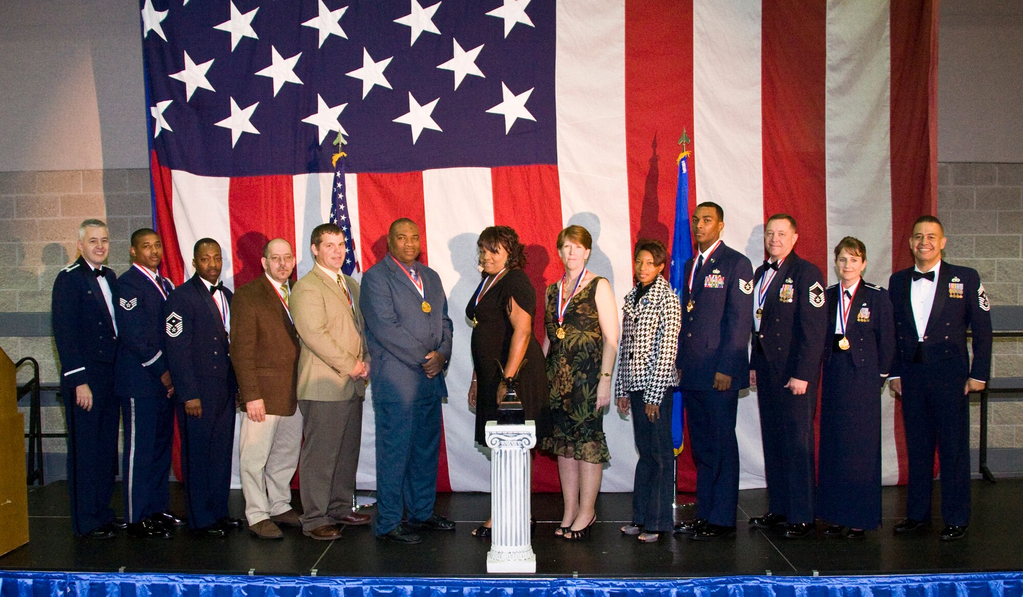 MOODY AIR FORCE BASE, Ga. -- The 23rd Wing 2008 Annual Award winners pose for a photo with (far left) Col. Kenneth Todorov, 23rd Wing commander and (far right) Chief Master Sgt. Paul Burgess, 23rd Wing command chief, during the ceremony held at the James H. Rainwater Conference Center Jan. 31. (Photo by Pat Gallagher/Valdosta Daily Times)