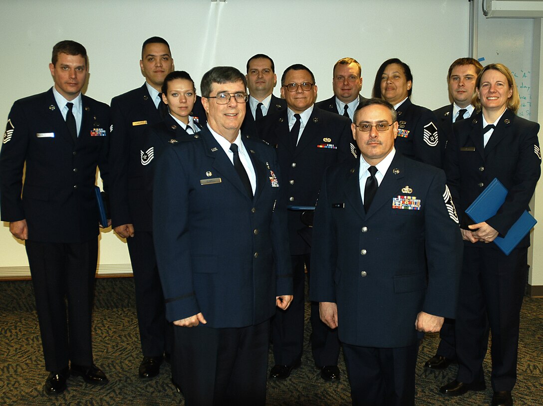 A special recognition ceremony was held here, January 11, 2009, for those 911th Airlift Wing members who recently graduated from the Community College of the Air Force.  Also in the photo with the graduates are 911th Airlift Wing Commander Colonel Gordon H. Elwell and Command Chief Master Sgt. John Payne.