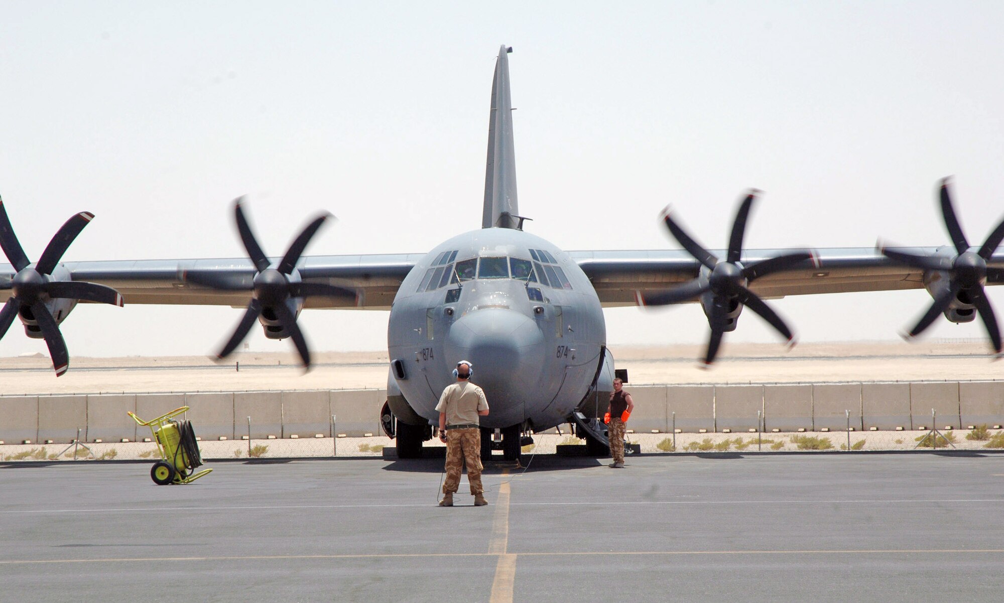 An Air Force C-130 Hercules taxies to a stop at a base in Southwest Asia after an airlift mission. C-130s provide intra-theater heavy airlift support transporting troops and cargo as part of operations in Afghanistan and Iraq. (U.S. Air Force photo/Master Sgt. Ken Stephens)