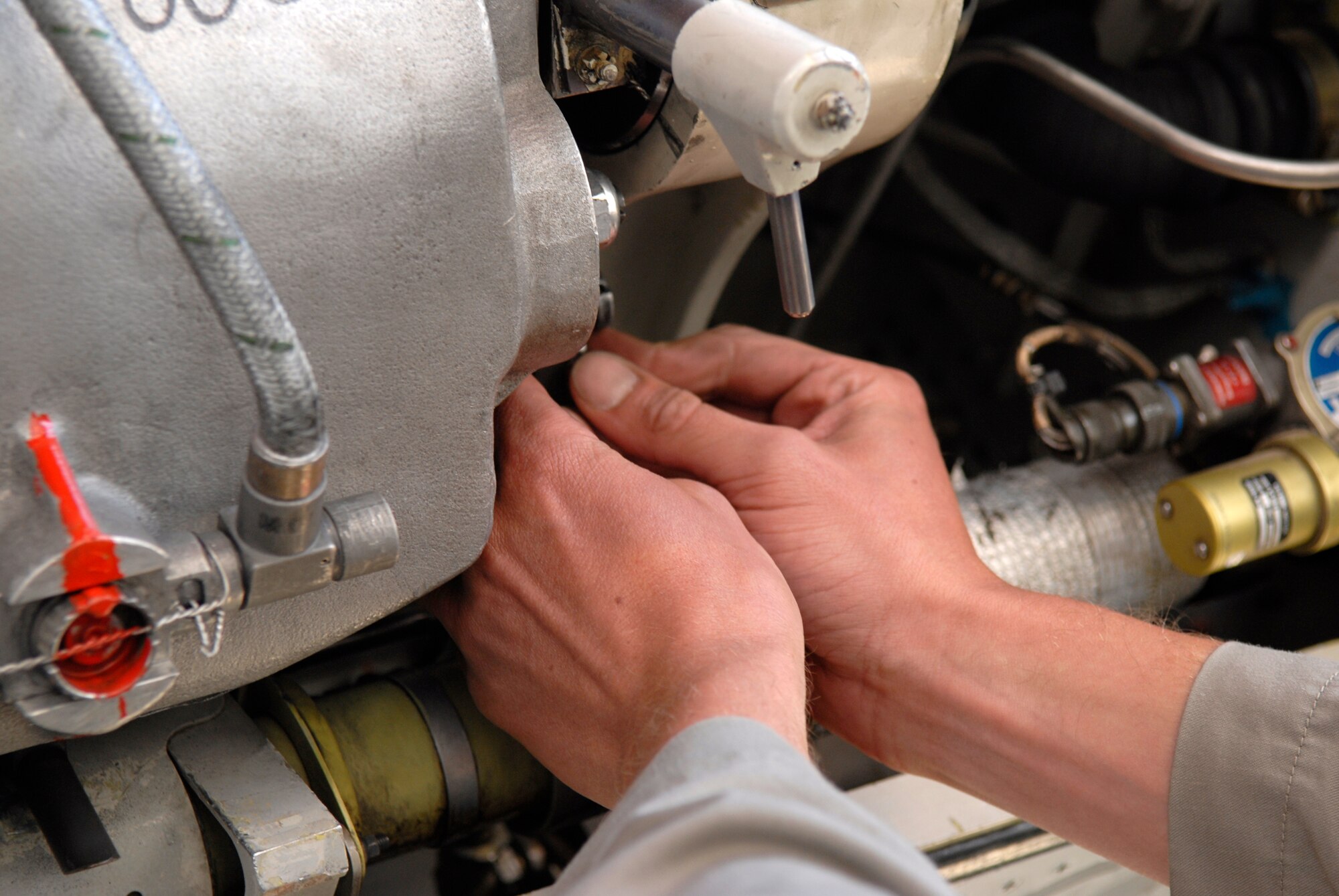 Senior Aircraftsman Paul Myhill, 9th Bomber Squadron detachment, inspects the electrical system for the gun turret on a Tornado GR4 aircraft Feb. 4, 2009, at an undisclosed location in Southwest Asia.  SAC Myhill hails from Norwich, England and is deployed from Royal Air Force Marham near Norfolk, England in support of Operation Iraqi Freedom. (U.S. Air Force photo by Airman 1st Class Andrew Satran/released)